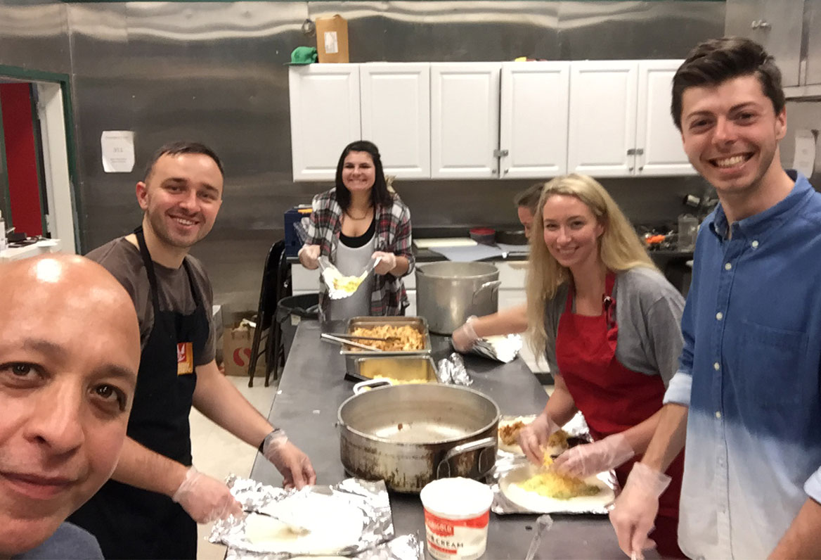 meal-prep employees preparing food in kitchen